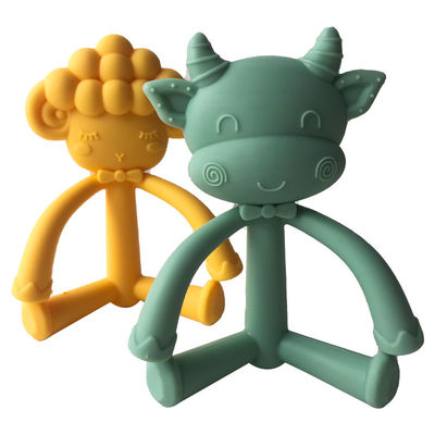 注文の漫画のシリコーンの赤ん坊Teether、食品等級のシリコーンのlnfant訓練の歯ブラシ牛およびヒツジの形